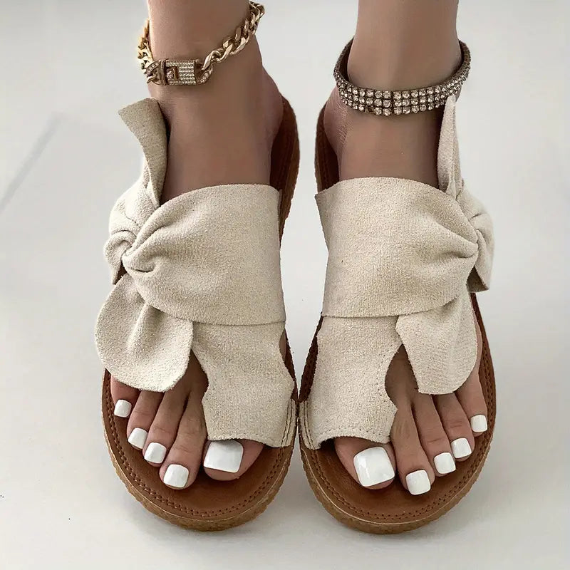 Sandalias de mujer con lazo de moda.