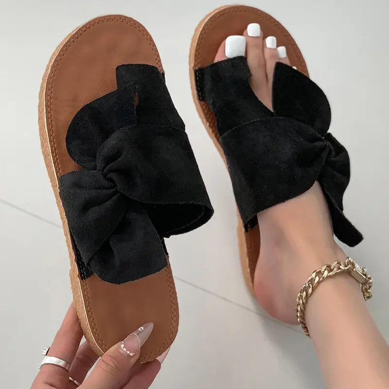 Sandalias de mujer con lazo de moda.